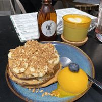 Pancakes Pea-Bananuts, Golden Milk (with Oatmilk)  at Sugar Rabbit Kaffé in Albufeira