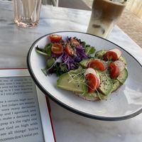 Avocado open toast with iced soya latte   at Sugar Rabbit Kaffé in Albufeira