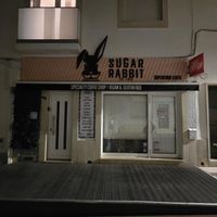 Night time view....tables on decking when open... at Sugar Rabbit Kaffé in Albufeira