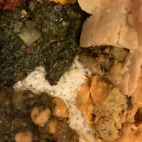 A take-out feast including Shaag Bhaje, Vegetable Samosa, and Bhujia. at New Paltz Indian Restaurant in New Paltz