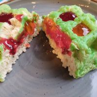 Pistachio cake with rice puffs, peach and raspberry jam at Garun in Yerevan
