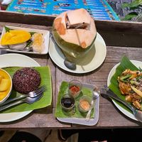 Yellow curry, pad see ew, fresh coconut, mango sticky rice  at Mr Green in Chiang Mai