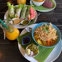 Pineapple curry and rice, khao soi, spring rolls and mango smoothies!   at Mr Green in Chiang Mai