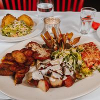 Sampler plate with Salteñas  at Peña Pachamama in San Francisco