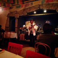 Eddy Navia - co-owner (with wife Quentin) and Latin Grammy Nominated Musician. at Peña Pachamama in San Francisco