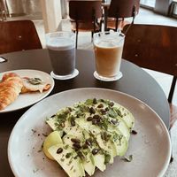 Vegan avocado cashew creme toast + oat milk latte  at Federal Cafe in Barcelona