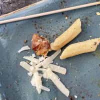 Meat with Parmasan cheese in a “vegan” dish at Café Solo in Kleve