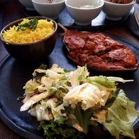 stuffed aubergine with tomatey chili sin carne and some side salad at Green House  in Brussels