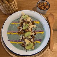 Catch the Wave:
Banana, mango, pineapple, oat milk, blue spirulina, kiwi, coconut chips, coconut flakes, banana nut, homemade granola. at Cafe Coco Hut in Chiang Mai