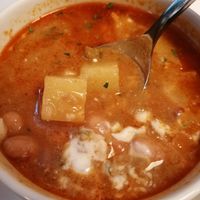 Beans, carrots, turnip, celery, onion, potato, soy yogurt at Napfényes Restaurant & Confectionery in Budapest