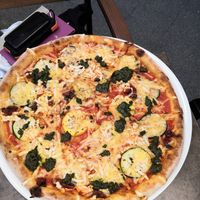 Mediterranean pizza at Napfényes Restaurant & Confectionery in Budapest