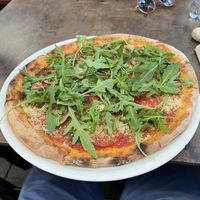 Pesto and tomato pizza  at Napfényes Restaurant & Confectionery in Budapest