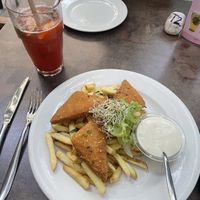 Fried vegan cheese with chips and strawberry lemonadee  at Napfényes Restaurant & Confectionery in Budapest