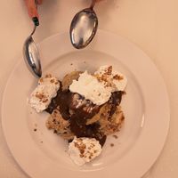 Somlói galuska  at Napfényes Restaurant & Confectionery in Budapest