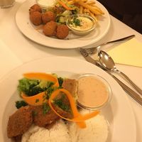 Seitan kiev (front), falafel platter (in the back) at Napfényes Restaurant & Confectionery in Budapest