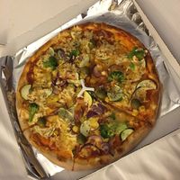 Pizza at Napfényes Restaurant & Confectionery in Budapest