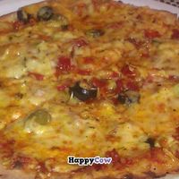 Delicious pizza at Napfenyes Etterem. at Napfényes Restaurant & Confectionery in Budapest