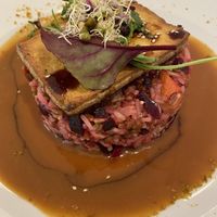 Grilled tofu and ginger risotto at Napfényes Restaurant & Confectionery in Budapest