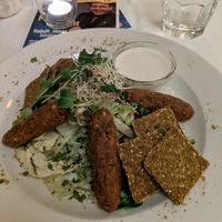 The raw plate was really tasty, especially the crackers! at Napfényes Restaurant & Confectionery in Budapest