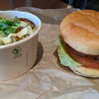 side of fried Brussels sprouts and a Faux Real burger at Planetary Burger in Vancouver