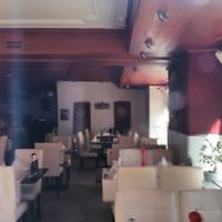 Interior (photographed through uneven glass) at La Rocca in Zofingen