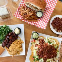 Gator po boy, red beans and rice, creole nachos, coconut cake, and the combo plate with bbq tofu/mac&cheese/braised spinach/cornbread   at Souley Vegan in Oakland