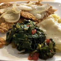Country fried seitan steaks. Comes with mashed potatoes and collard greens. 🤤   at Souley Vegan in Oakland