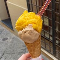 Vegan cone with hazelnut Ice cream based on soya and mango sorbet on top 😋 at Gelateria k2 in Alghero