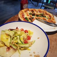 Vegan courgette salad and pizza at The Punt Yard in Cambridge