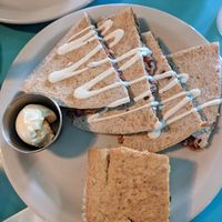 Pulled Jackfruit Quesadillas with side of jalapeno cornbread at Counter Culture in Austin