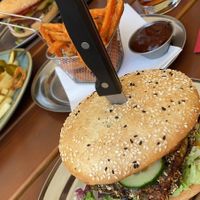 Tempeh Burger with Sweet Potatao fries and loaded fries  at Bodhi in Ulm