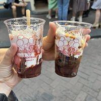 Dark chocolate and raspberry with strawberry and oreo, and whipped cream on top    at Monte Pelmo in Amsterdam