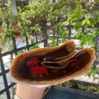 Bitter ION (chocolate) spread with strawberries, in a vegan crepe!  at Navarino Creperie in Thessaloniki