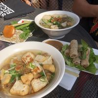 Tofu pho (left) mushroom pho (right) and crispy spring rolls with peanut sauce  at Pho in Cardiff