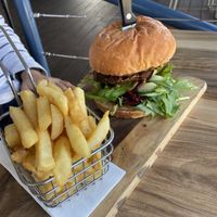 Vegan burger with zucchini fritter   at The Deck in Forster