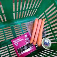 Dried apricots, carrots, olive paste, and energy bars at Diakrousis Supermarkt in Kefalonia