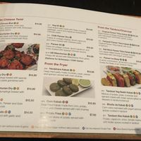 Orange V symbol means can be made vegan at Status in Auckland