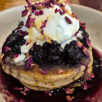 Pancakes with berries and icecream. Yum!! at 1Two1 Vegan Café in Springwood