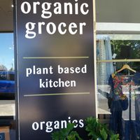 Outside signage at 1Two1 Vegan Café in Springwood