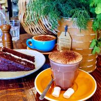 Chocolate on chocolate! Delicious hot chocolate and cake. at 1Two1 Vegan Café in Springwood