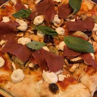 The delicious capricciosa pizza! at Blu Bar in Barcelona