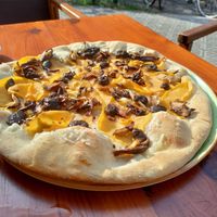 Yummy but too many parts of the pizza without topping! at Blu Bar in Barcelona