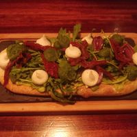 Mediterráneo -
Focaccia with guacamole, cashew cheese, dried tomatoes, rocket pesto, Kalamata olives, rocket - 11.90 € at Blu Bar in Barcelona