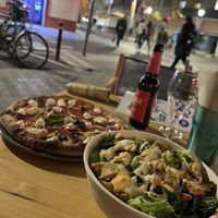 ‘Healthy’ pizza and Caesar salad  at Blu Bar in Barcelona