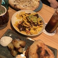 nachos, pulled pork goes happy, cheese lovers pizza (no longer on menu, but i hope they bring it back!!)   at Blu Bar in Barcelona