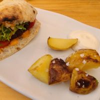 Veggie burger with potatoes at Blu Bar in Barcelona