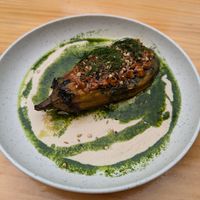 "Berenjena gourmet": roasted eggplant, peanut sauce, tahini sauce, mixed seeds and dill at Blu Bar in Barcelona