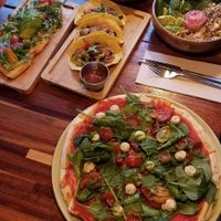 Popeye pizza, tacos, avocado bread, buddha bowl, zucchini spaghetti. at Blu Bar in Barcelona