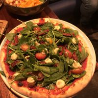 pizza with arugula pesto at Blu Bar in Barcelona