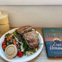 Peaceful Temph and banana mango smoothie. Book not included.  at Sugar Apple Organic Cafe in Key West